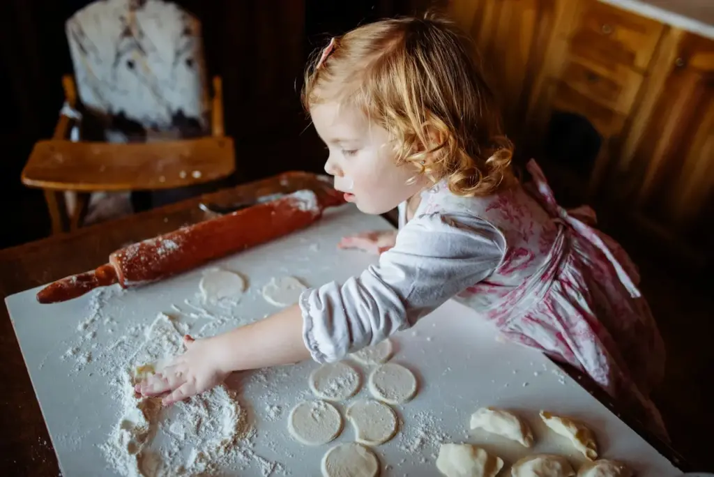 Girl Shaping the Dough 