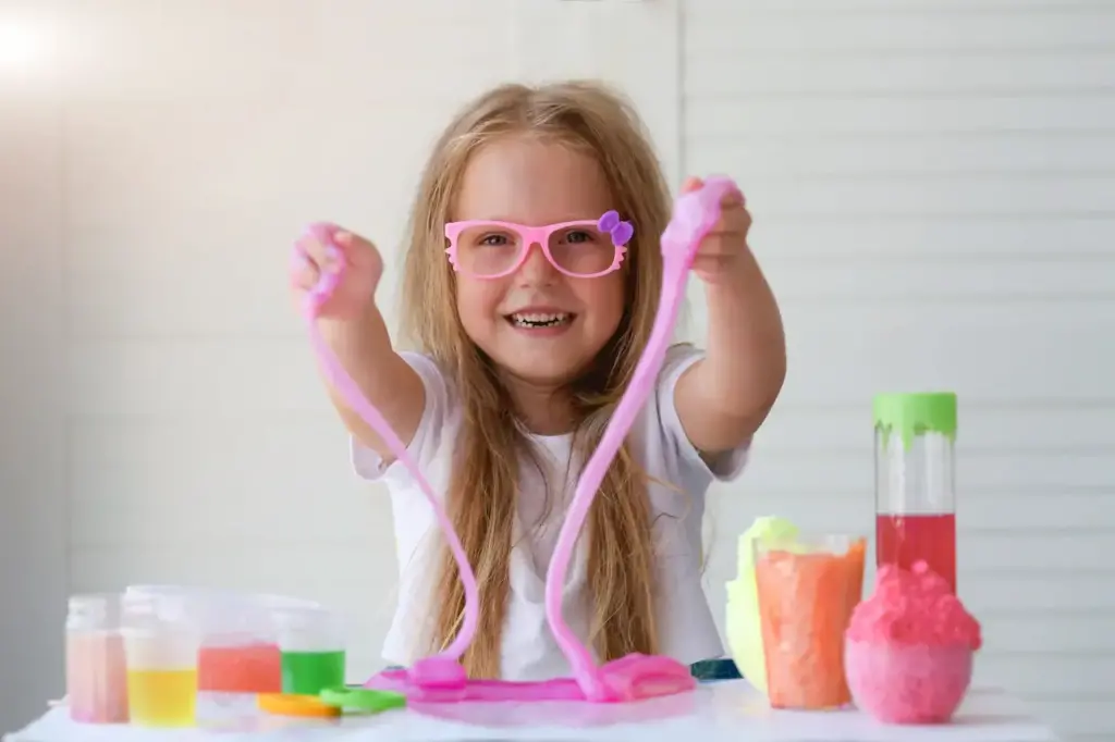 A Little Girl Playing Slime Toy 